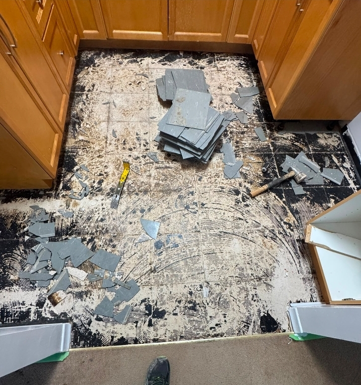 Ceramic tile removal and subfloor preparation in a Hamilton kitchen renovation
